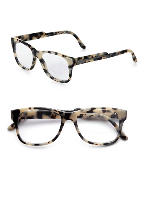 large square tortoise shell glasses.